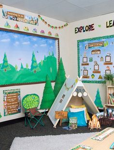 a child's room with a teepee tent and play area