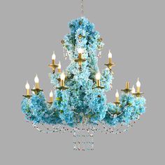 a chandelier with blue flowers on it