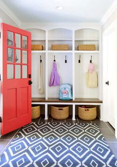 the entryway is decorated in white and red