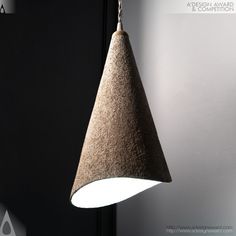 a light hanging from the side of a wall