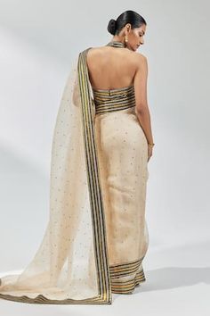 Beige, black saree with sequin, zari, aari embroidery all over. Paired with halter neck embroidered blouse and petticoat. - Aza Fashions Transitional Pre-draped Saree With Resham Embroidery For Celebration, Transitional Celebration Pre-draped Saree With Resham Embroidery, Fitted Chanderi Pre-draped Saree For Celebration, Sequin Halter, Aari Embroidery, Black Saree, Silk Organza, Halter Neck, Embroidered Blouse