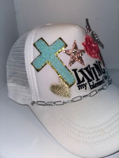 Faith themed Trucker Patch Hat. These are the hottest trend on social media today. Great for festivals, concerts, night life and everyday wear. This foam trucker hat is fully adjustable and offered in hat colors Black, White, Light Pink, Neon Pink, Neon Yellow and Green Camouflage. Custom Hats avail. One size fits all. $45 Small Print: patch, mama, cowboy, hat, faith, rock and Roll, trucker, patch, cap, chain, iron on, sew on, festival, concert, neon, baseball cap, ball hat, chain, vintage, retro, trendy, patch hat, cowgirl, rocker mama, mom, beanie, rodeo, applique designs, embroidered, polyester hat, gifts for her, night life, everyday hat, collage cap, sparkly, sparkle hat, horse, charms Trendy Festival Snapback Hat One Size, Trendy Festival Snapback Hat, Trendy Snapback Hats For Festival, Trendy Snapback Hat For Festivals, Trendy Flat Brim Baseball Cap For Festivals, Trendy Adjustable Mini Hats For Festivals, Adjustable Baseball Cap Trucker Hat For Festivals, Adjustable Trucker Baseball Cap For Party, Adjustable Trucker Baseball Cap For Festival