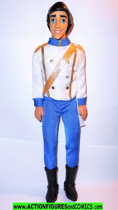 a toy soldier is wearing blue pants and a white jacket with gold trimmings