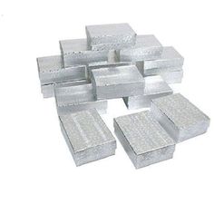 several pieces of metal are stacked on top of each other in the shape of squares and rectangles