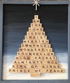 a christmas tree made out of scrabble tiles