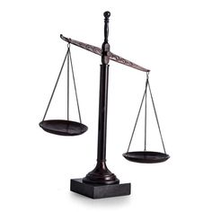 an old fashioned balance scale on a white background with clippings to show the scale