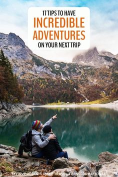 two people sitting on rocks pointing at the mountains with text overlay that reads tips to have incredible adventures on your next trip