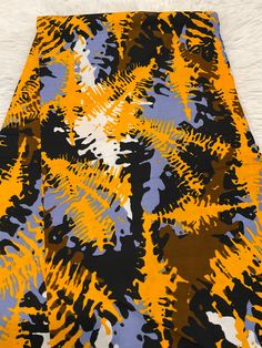 This multicolor African Fabric is high quality African print made from 100% cotton and it's 45 inches wide. It is used for making African Clothing, African quilts, & For Home decoration. FYI: Print is Double sided. The listing is for 1, 6 yards and Headwrap Each piece of fabric measures:  36in by 45in for 1 yard 216in by 45in for 6 yards 72in by 22in for Head wrap If you purchase more than one yard, you will receive one continuous piece. *If you require more than what I have listed, feel free to Printed Yellow Ankara Fabric, Yellow Printed Ankara Fabric, African Quilts, Clean And Press, African Prints, Ankara Fabric, Yellow And Black, African Fabric, African Clothing