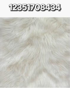 the fur is white and has numbers on it