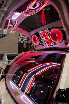 the inside of a car with speakers and lights