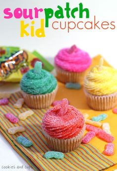 colorful cupcakes with sprinkles are on a yellow napkin and the title says, sour patch kid cupcakes