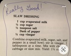 a recipe for slaw dressing is shown on a piece of paper with blue writing