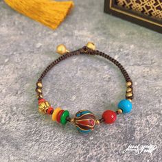 Women's Ethnic Style Bell Collection Classic Fashion Bracelets Colorful Beads Bracelets For Festivals, Multicolor Bohemian Bracelets For Festivals, Bohemian Multicolor Bracelets For Festivals, Multicolor Bohemian Bracelet For Festivals, Bohemian Bangle Friendship Bracelets, Bohemian Festival Bracelets, Adjustable Brown Bracelet For Festivals, Brown Bohemian Bracelets For Festivals, Adjustable Brown Bracelets For Festivals