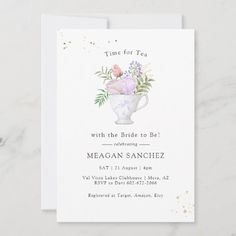 a white card with flowers in a vase on the front, and text that reads time for tea with the bride to be