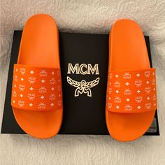 New Mcm Men’s Slides. Persimmon- Orange. Size 12. Retail $200.00. $10” Mcm Shoes, Mens Slides, Persimmon, Flip Flop Sandals, Color Orange, Flip Flops, Shoes Sandals, Slides, Men's Shoes