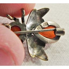 Beautiful mid century sterling silver and natural amber figural fly jelly belly brooch. Sweet piece! Marked on back "925" and "LS". American made. Circa mid 1900s. Great Condition as shown. Nice patina.  Measurements - 1" x .75" x .25" Insect Jewelry Design, Bug Brooch, Insect Jewelry, Jelly Belly, Natural Amber, Silver Spoons, Animal Skin, American Made, Cute Jewelry