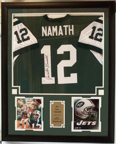 an autographed football jersey is displayed in a framed frame with the number 12 on it