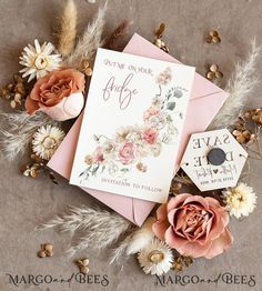 wedding stationery with pink envelope and flowers