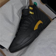 Jordan 12 Retro Black Taxi Size 6/5 Brand New Used Once No Box Black Jordan Shoes With Boost Midsole For Streetwear, Black Sporty Jordan Shoes With Rubber Sole, Black Leather Jordan Shoes For Streetwear, Black Sporty Custom Sneakers, Black High-top Synthetic Jordan Shoes, Black High-top Jordan Shoes Synthetic, Black Synthetic High-top Jordan Shoes, Black High-top Jordan Shoes For Streetwear, Black Leather Low-top Jordan Shoes