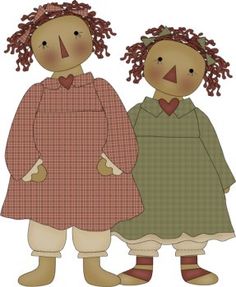 two dolls are standing next to each other