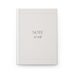 a white book with the words note to self written on it's front cover