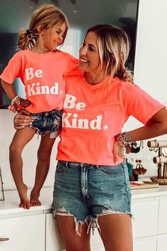 Orange Be Kind Graphic Family Matching Outfit Mom T-shirt Orange Short Sleeve T-shirt With Letter Print, Family Matching Summer T-shirt With Screen Print, Orange Short Sleeve T-shirt With Text Print, Fun Short Sleeve Tops With Letter Print, Orange Relaxed Fit T-shirt With Letter Print, Orange Letter Print T-shirt For Spring, Summer Orange Tops With Slogan, Orange Short Sleeve Top With Slogan, Orange Graphic Tee With Slogan