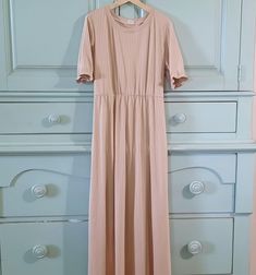 Modest maxi dress that is neutral and would be perfect for your family photo shoot. Dress has puffed sleeves and maxi skirt. Dress For Family Photos, Dress With Puffed Sleeves, Neutral Dress, Modest Maxi Dress, Modest Maxi, Beige Dress, Knit Maxi Dress, Modest Dress, Beige Dresses