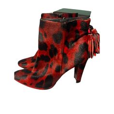 Make A Bold Statement With These Eye-Catching Red Leopard Print Ankle Boots. Featuring A Sleek Silhouette, High Heel, And Playful Tassel Detail, These Booties Are Perfect For Adding A Fierce Touch To Any Outfit. Ideal For Nights Out, Special Events, Or When You Want To Inject Some Wild Glamour Into Your Everyday Look. The Vibrant Red And Black Pattern Ensures You'll Stand Out From The Crowd, While The Ankle Height Offers Versatility For Various Seasons. Keywords: Leopard Print, Red Ankle Boots, High Heel Booties, Tassel Detail, Statement Shoes, Animal Print, Fashion Boots, Party Shoes, Trendy Footwear, Bold Shoes Red Boots Women, Leopard Print Ankle Boots, Red Ankle Boots, Bold Shoes, Red Leopard, Stuart Weitzman Shoes, Statement Shoe, Red Boots, Casual Skirts