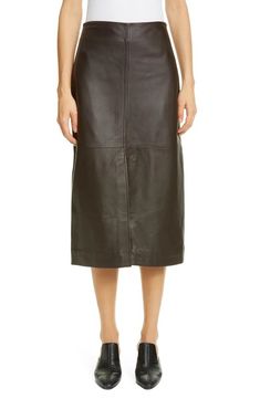 Elevate your wardrobe with our exquisite brown genuine lambskin leather skirt--a luxurious blend of timeless elegance and comfort. This pencil-style skirt, designed to fall gracefully to knee length, is the epitome of chic sophistication. Key Features: Premium Lambskin Leather: Crafted from high-quality lambskin leather, this skirt is incredibly soft to the touch, durable, and designed to stand the test of time. Pencil Style: The classic pencil style of this skirt offers a flattering and tailored fit that accentuates your curves while maintaining a professional and chic look. Knee Length: Falling elegantly to knee length, this skirt strikes the perfect balance between modesty and style, making it suitable for various occasions. Exceptional Comfort: The soft and supple nature of lambskin le Skirt Leather Outfit, Outfit Leather Skirt, Womens Leather Skirt, Sophisticated Office, Crisp White Blouse, Leather Pieces, Beautiful Skirts, Leather Outfit, Knee Length Skirt