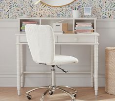 a white desk chair sitting in front of a mirror