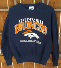 Denver Broncos Sweatshirt -  Shoulder - 21.5" Chest - 44" Sleeve - 21.5" Length - 23.5" Tag - M Thanks! Throwback Long Sleeve Letter Print T-shirt, Broncos Sweatshirt, Nfl Sweatshirt, Navy And Orange, National Football League, Denver Broncos, Football Fans, Nfl Football, Sweater Hoodie