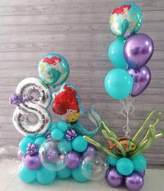 ariel the mermaid balloon centerpiece with balloons