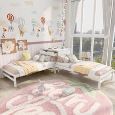 a child's bedroom with two twin beds and a pink rug on the floor