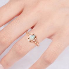 Gorgeous vintage inspired Australian opal ring ✧ Sterling silver (925) or 14K Gold or 14K Rose gold ✧ Accented with natural quartz diamonds This gorgeous, timeless ring features a stunning Australian opal and natural crystals. ✧ Stone: Natural Gemstone  ✧ Shape: Oval ✧ Carat Weight: 0.53ct. (approx.) ✧ Gemstone Origin: Australia  ✧ Sizes 2.75-12.25 ✧ This ring set will arrive ready to gift in a Kherish Box. ✧ Due to the nature of the handmade process, each piece may slightly vary in color, size, Australian Opal Ring, Gold Stacking Ring, Timeless Ring, Rose Gold Accents, Ring Opal, Opal Ring Gold, Jewelry Dainty, Gold Ring Stack, Ring Rose Gold