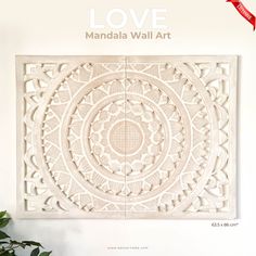 the front cover of love magazine with an intricate design on it's back wall