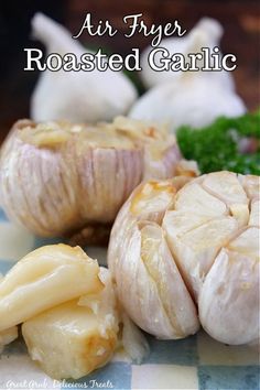 an image of roasted garlic with broccoli on the side