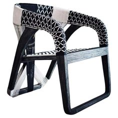 a black and white chair with an interesting design