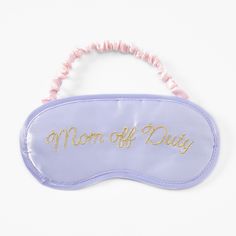 A mom's work is never done, so it makes sense she would be tired! Pamper Mom with this luxurious sleeping mask, perfect for anytime she just wants to lie down and rest for a few minutes. It has a soft, satin-like texture to really pamper her, and "Mom off duty" is embroidered in golden script, to let everyone know she isn't to be bothered. The back strap stretches to fit and keeps the mask in place while she naps. It's a perfect gift for Mother's Day, her birthday, or anytime you want to show he Strap Stretches, Sublimation Ideas, Fashionable Jewelry, Sleeping Mask, Cricut Projects Vinyl, Global Brands, Everyone Knows, Sleep Mask, Beauty Accessories