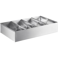 a stainless steel sink with four compartments on the bottom and one in the middle, against a white background