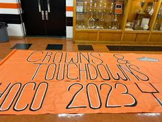 an orange banner with the words grown and touchings on it