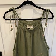 Green Crinkle Material With Smocked Bib And Tie Shoulder Straps. Two Front Pockets, One Back Pocket. Stretch Pant Hem. Wear Alone, With Tee Or Tank Underneath Or As A Swimsuit Cover Up. Wore Once. Excellent Condition, Looks Brand New. Green Relaxed Fit Jumpsuits And Rompers For Beach, Green Relaxed Fit Jumpsuit For Beach, Summer Daywear Jumpsuits And Rompers With Smocked Back, Casual Jumpsuits And Rompers With Smocked Back For Daywear, Green Smocked Back Jumpsuit For Summer, Green Smocked Back Jumpsuits For Spring, Green Vacation Jumpsuits And Rompers With Smocked Back, Green Vacation Jumpsuits With Smocked Back, Green Jumpsuits And Rompers With Smocked Back For Vacation