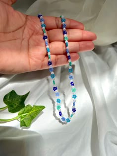 I love this necklace so much, and the different shades of blue with the pearls is such a good match😍 Blue Bead Necklace, Handmade Accessories Necklace, Flower Necklace Diy, Blue Pearl Necklace, Seed Bead Bracelets Diy, Cute Necklaces, Jewlery Necklace, Wire Wrap Jewelry Designs, Making Necklaces