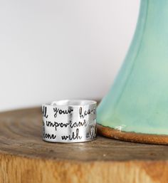 This style is set to get attention. Made from sterling silver, this inspiration ring has a durable construction that will last you for years. Each letter is hand stamped one at a time, so each impression is sharp and will literally last FOREVER. So fill your heart with what's important...♥ and be done with all the rest. What makes your heart beat? 1/2" wide Marked .925 Sterling Silver Choose Your Size Relationship Rings, Silver Quotes, Feather Ring Silver, Moon And Star Ring, Hammered Silver Ring, Feather Ring, Kids Rings, Personalized Ring, Silver Feather