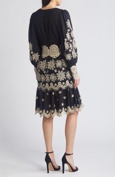 This linen-kissed dress is decorated by contrasting lace appliqué details and framed by long sleeves with lots of volume. V-neck Long sleeves 75% Tencel® lyocell, 25% linen Tencel lyocell is a sustainably produced fiber made with closed-loop processing Dry clean Imported Black Long Sleeve Dress With Lace Work, Elegant Long Sleeve Dress With Cutwork Hem, Elegant Embroidered Dress With Bishop Sleeves, Elegant Bishop Sleeve Dress With Lace Trim, Elegant Dress With Lace Trim And Bishop Sleeves, Aurora Dress, Kobi Halperin, Long Sleeve Wrap Dress, Embroidered Midi Dress