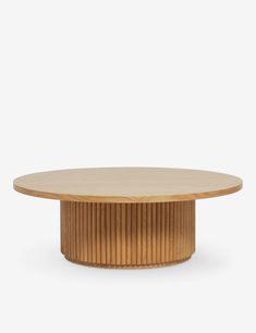 a round wooden table with pleated edges and a circular base, on a white background