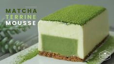 a piece of cake with green frosting on it and the words matcha terriine mousse