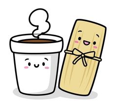 a cup of coffee next to a wooden stick with a smiling face on the side