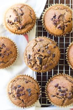 chocolate chip muffins on a cooling rack ready to be baked in the oven