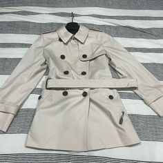 Nwt. Coach Tan Trench Coat. Size Medium. Coach Casual Spring Outerwear, Fitted Coach Outerwear For Fall, Coach Fitted Winter Outerwear, Winter Coach Fitted Outerwear, Coach Long Sleeve Fitted Outerwear, Coach Fitted Long Sleeve Outerwear, Fitted Long Sleeve Coach Outerwear, Coach Long Sleeve Outerwear For Fall, Classic Coach Long Sleeve Outerwear