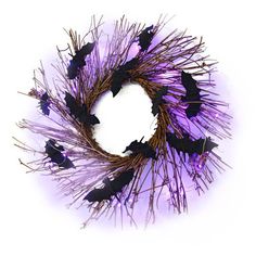 a purple wreath with bats hanging from it